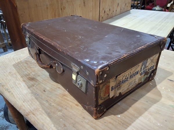 Lot 11 - LEATHER SUITCASE