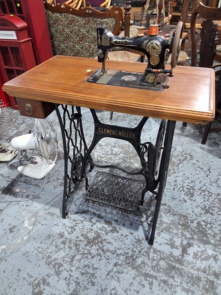 Lot 145 - TREADLE SEWING MACHINE