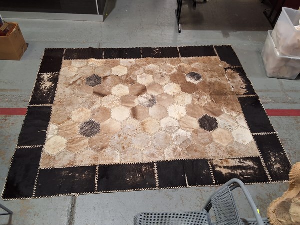 Lot 387 - LEATHER RUG