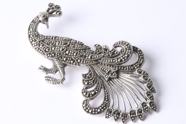 Lot 1029 - SILVER PEACOCK BROOCH