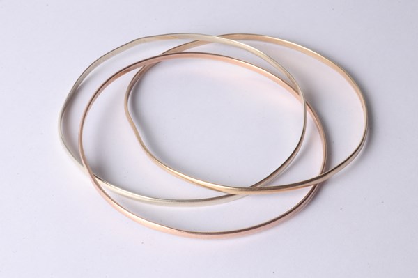 Lot 1026 - GOLD BANGLES