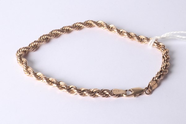 Lot 1077 - GOLD BRACLET