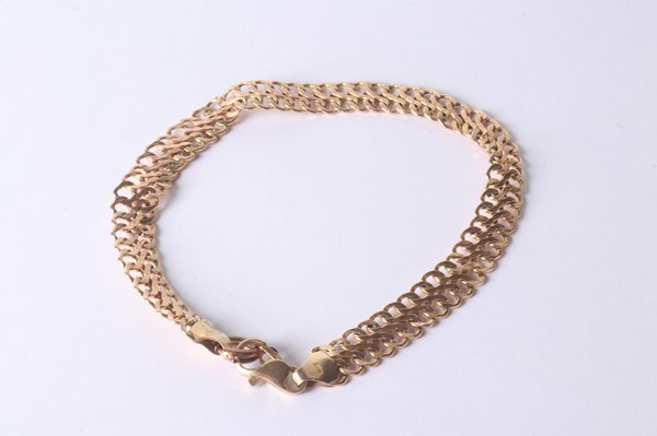 Lot 1078 - GOLD BRACLET