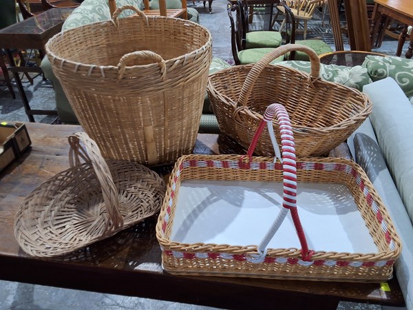 Lot 556 - CANE BASKETS