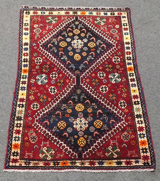 Lot 521 - PERSIAN RUG