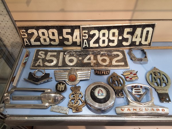 Lot 1211 - CAR BADGES AND PLATES