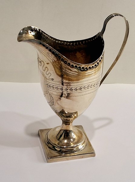 Lot 1057 - SILVER JUG