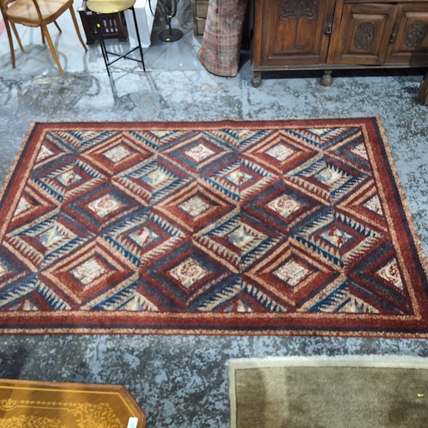 Lot 157 - WOOLLEN RUG