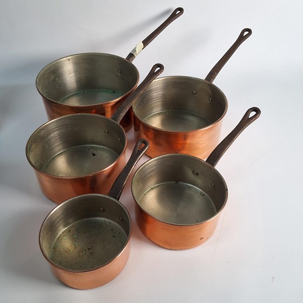 Lot 1475 - GRADUATED COPPER SAUCEPANS