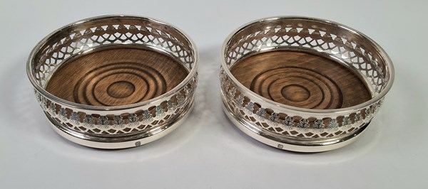 Lot 1115 - BOTTLE COASTERS