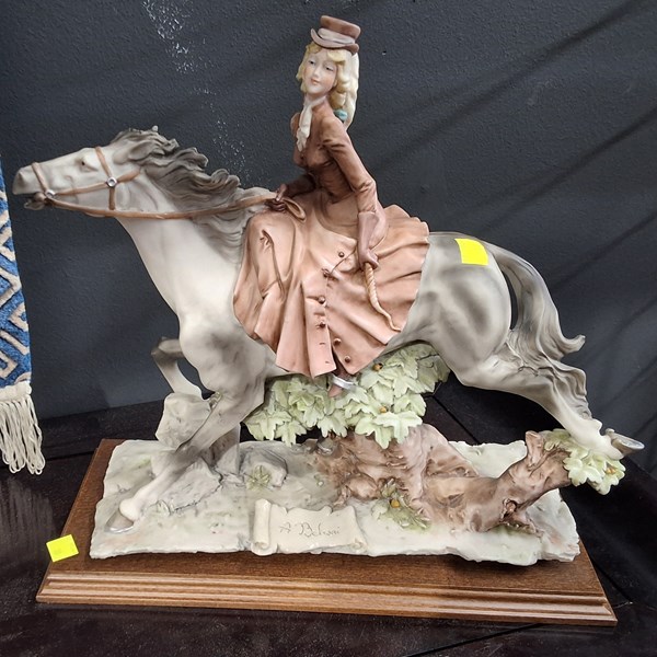 Lot 413 - WOMAN ON A HORSE